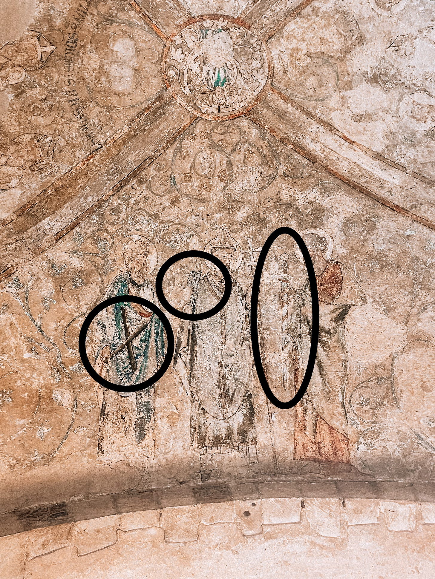 An image of the Norwich Cathedral treasury fresco of St Andrew, St Peter and St Paul with their identifying symbols circled - the saltire, the key and the sword