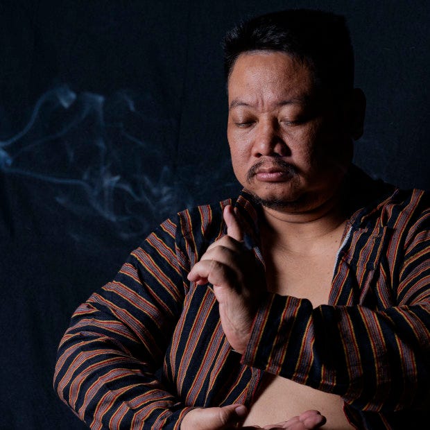 Popular Indonesian shaman Ki Kusomo at his office in Bekasi, West Java.