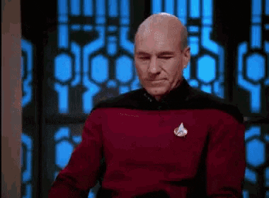 Captain Picard facepalming like only he can