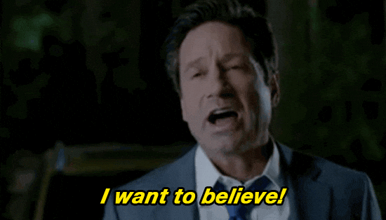 Mulder's very handsome face in frame, saying, "I want to believe." Does he ever want to believe.