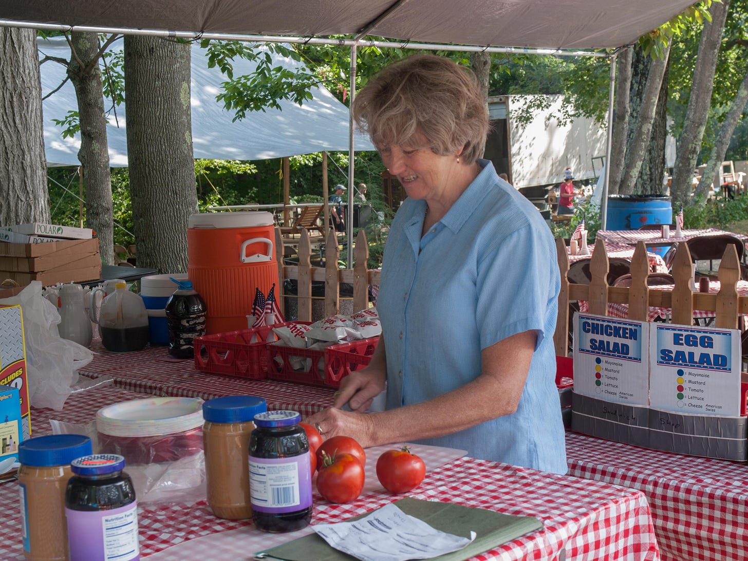 Kleta Dudley making sandwiches