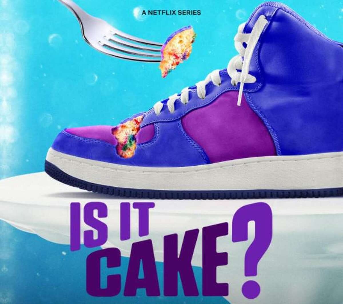A purple sneaker on a turquoise background is not actually a sneaker but a cake. A fork has broken away some of the cake revealing the multicoloured inside sponge