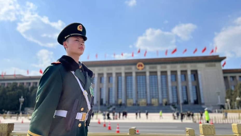 A soldier in front of the Great Hall of the People on March 11, 2024, the closing day of the National People's Congress in Beijing, China.