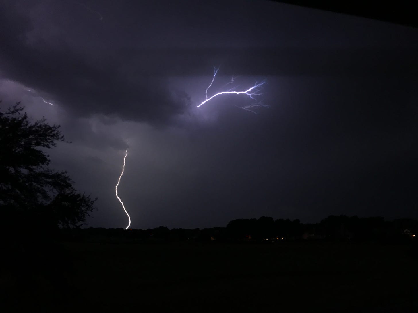 Lightning splits the night sky