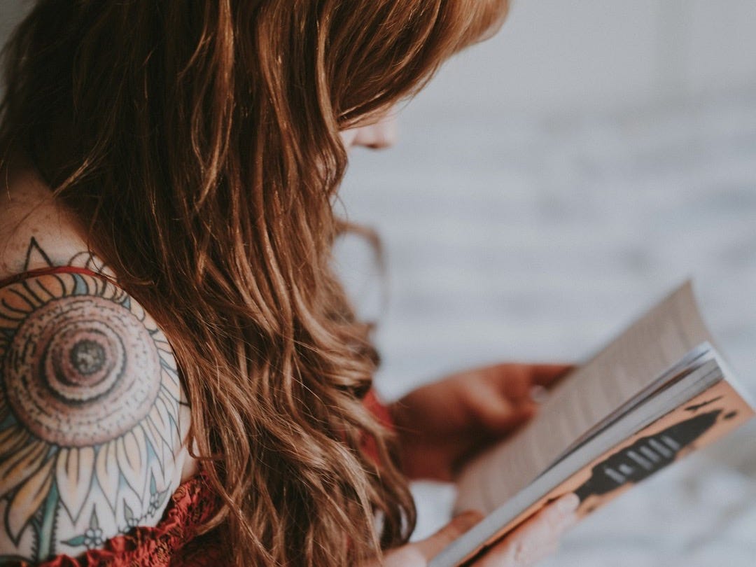 woman reading book