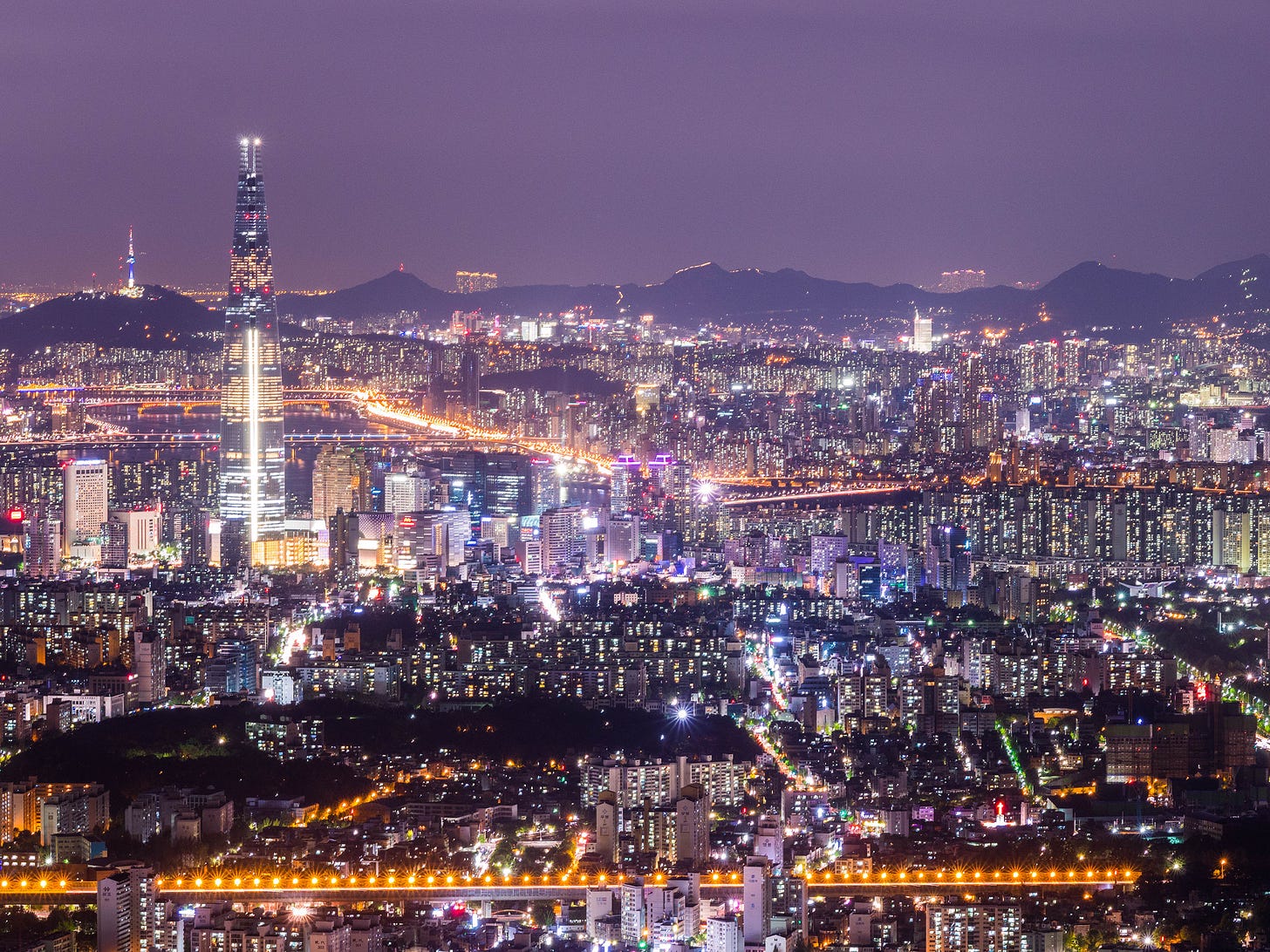 A photo of the Seoul skyline at night