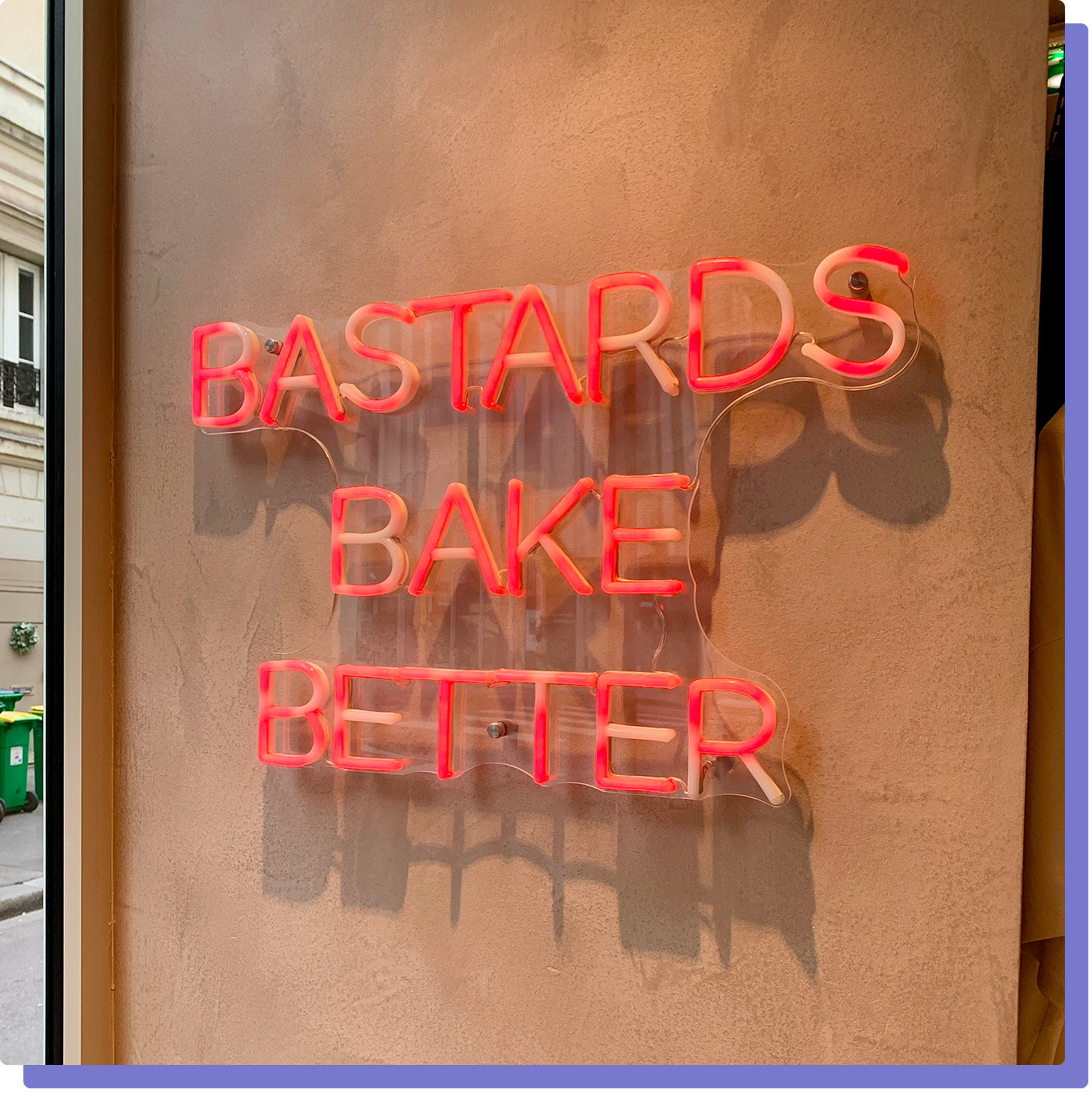 Photo of neon sign reading "Bastards Bake Better"