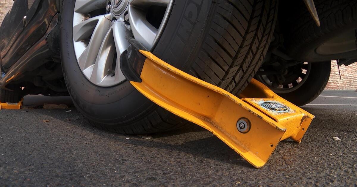 Man says his car was illegally booted; Metro regulators agree
