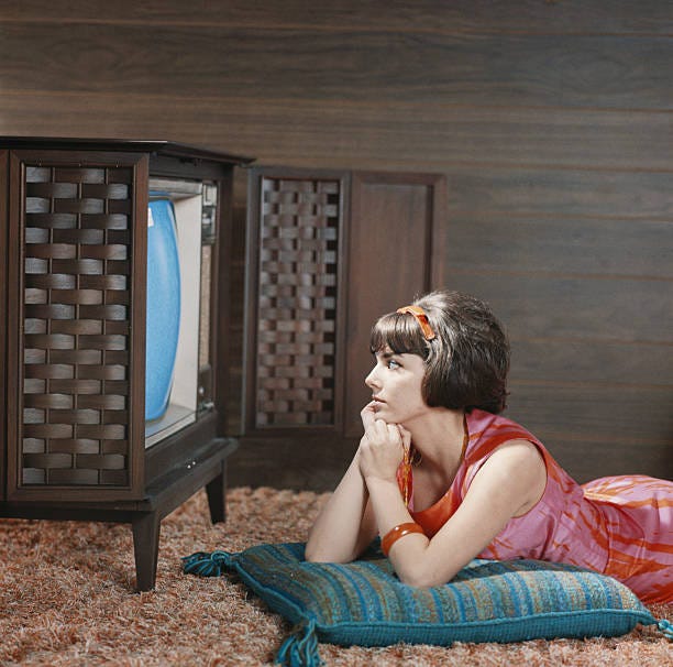 Young Woman Watching Television Stock Photo - Download Image Now -  Television Set, Archival, Old-fashioned - iStock