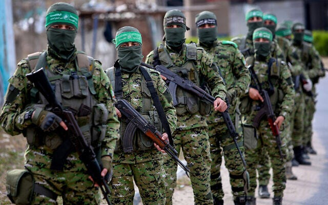 Palestinian members of the Izz ad-Din al-Qassam Brigades, the armed wing of the Hamas terrorist movement, during a patrol in Rafah, in the southern Gaza Strip on April 27, 2020. (Abed Rahim Khatib/Flash90)