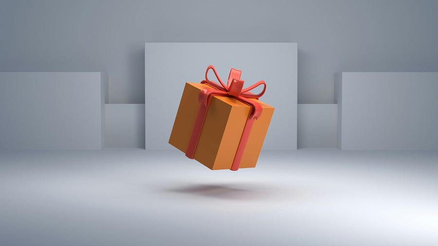 A gift box suspended in the air. A gift box suspended in the air.