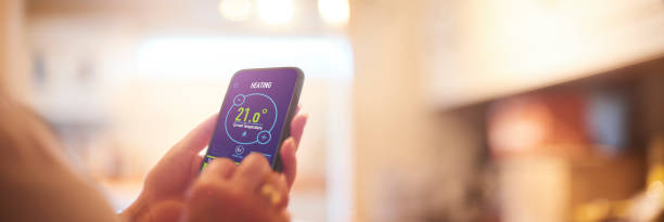 home heating app - temperature control stock pictures, royalty-free photos & images