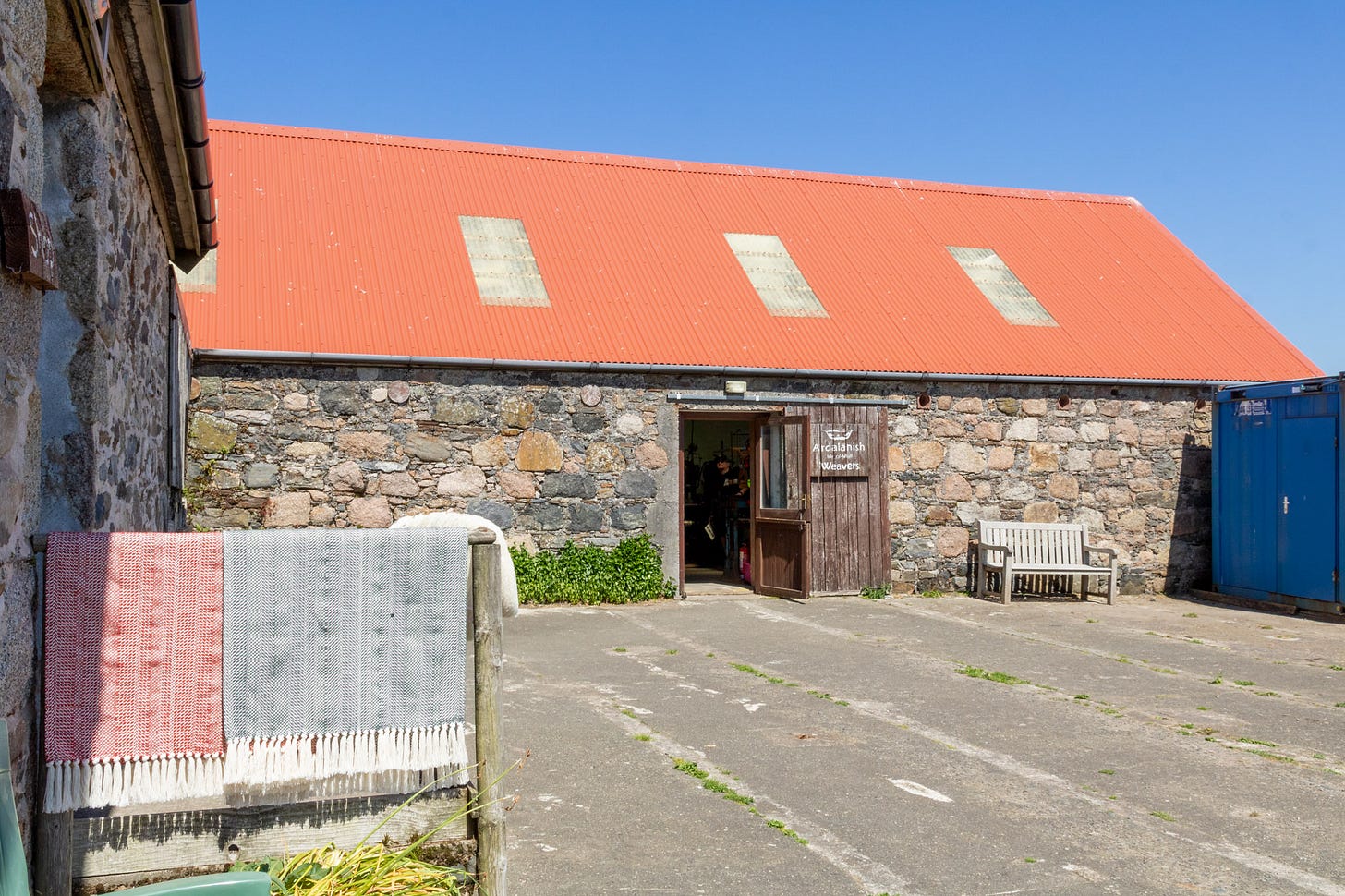 Ardalanish weaving shed with woollen throws hanging outside the shop © Felicity Martin