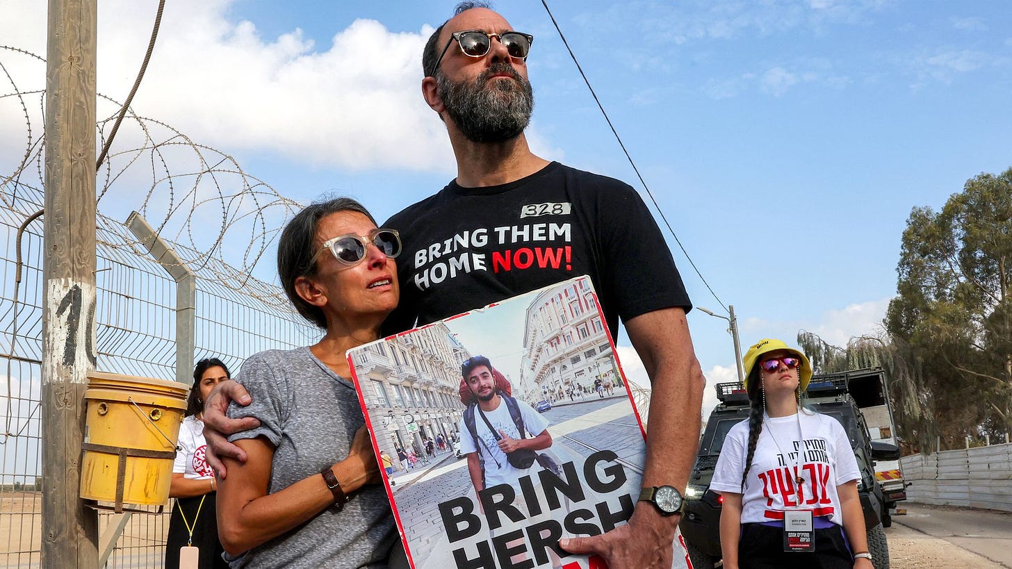 Jonathan Polin and Rachel Goldberg, parents of Israeli hostage Hersh Goldberg-Polin, attend a demonstration near Kibbutz Nirim in southern Israel by the border with Gaza on August 29, 2024