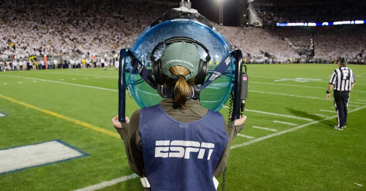 A sound technician with ESPN helps produce a telecast of a football game. A sound technician with ESPN helps produce a telecast of a football game.