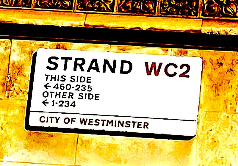 A Strand WC2 street sign, with the saturation whacked up to rather unpleasant levels