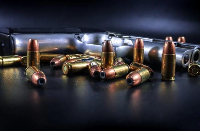 <p><em>Image via <a href="https://www.pexels.com/photo/gun-with-ammunition-15264966/">Pexels</a>.</em></p>