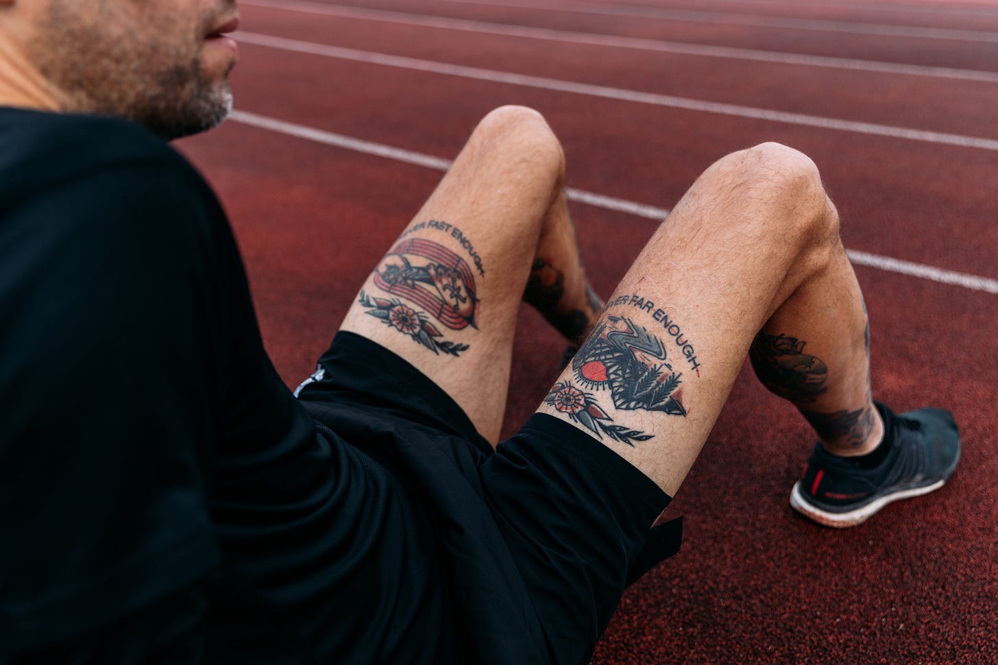 The author sitting on a track