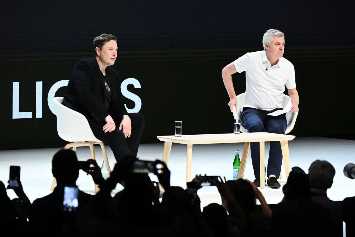 Elon Musk and Mark Read on stage at Cannes