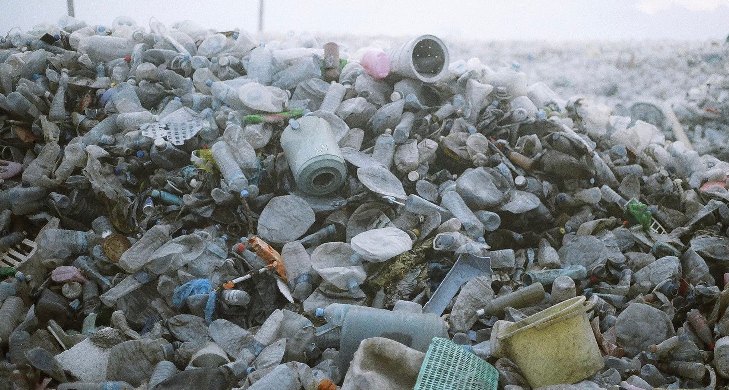 pile of discarded plastic containers.