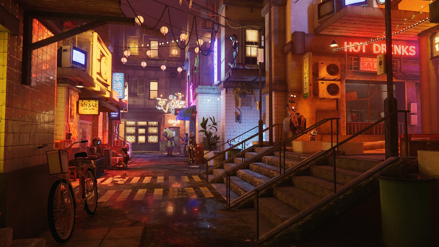 A street is illuminated at night by string lights and neon signs. Robots can be seen loitering. Various clutter fills the scene, such as a bike and plants.