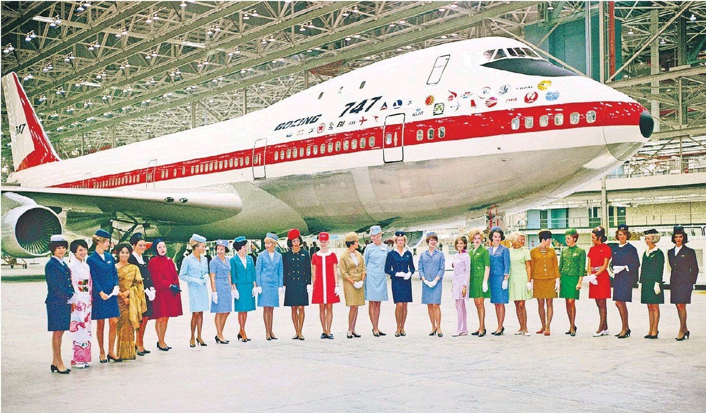 Cabin crews with the first 747, above. Cabin crews with the first 747, above.