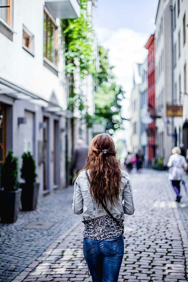 Person walking on street Person walking on street