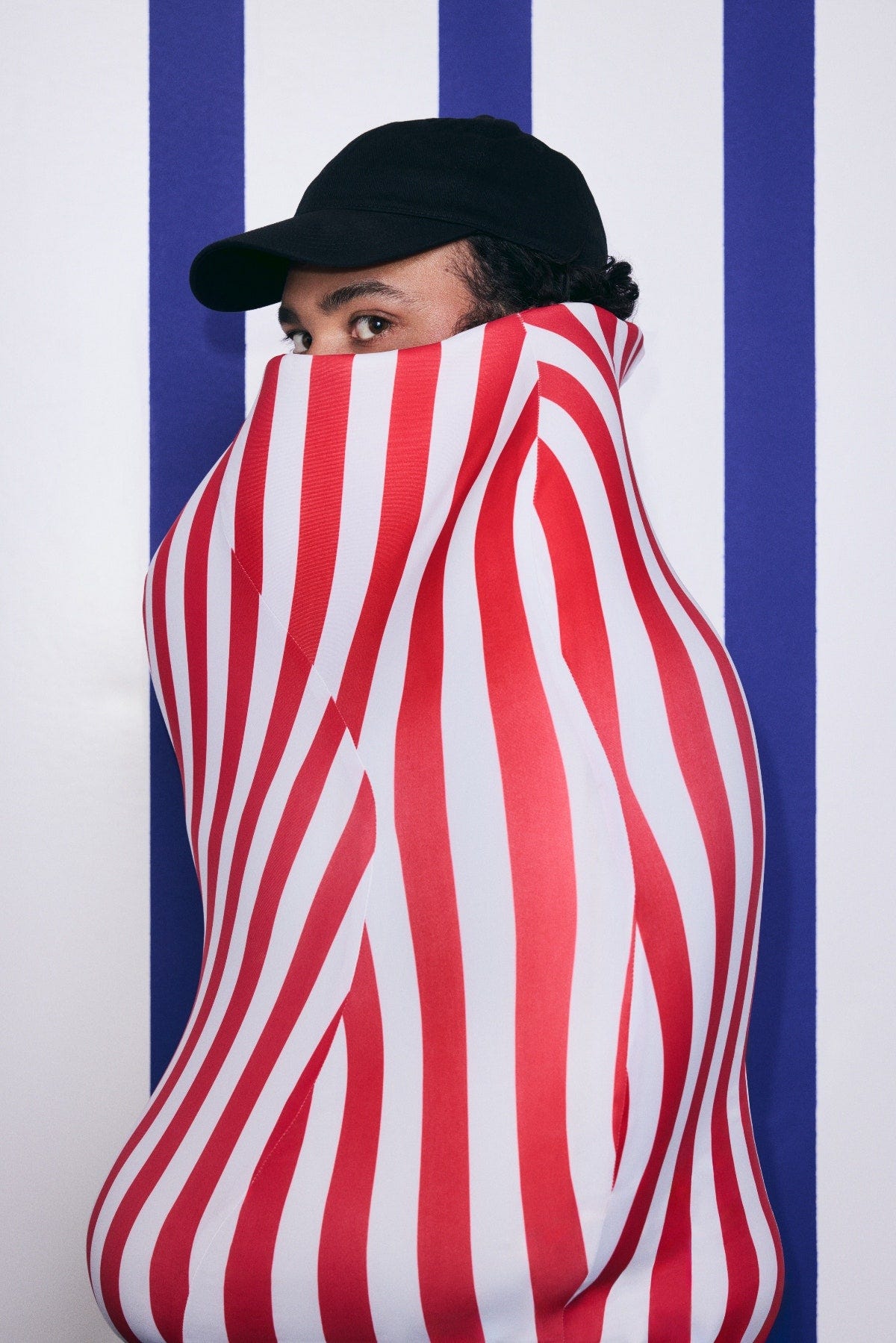 Image may contain Clothing Hat Adult Person and Cap