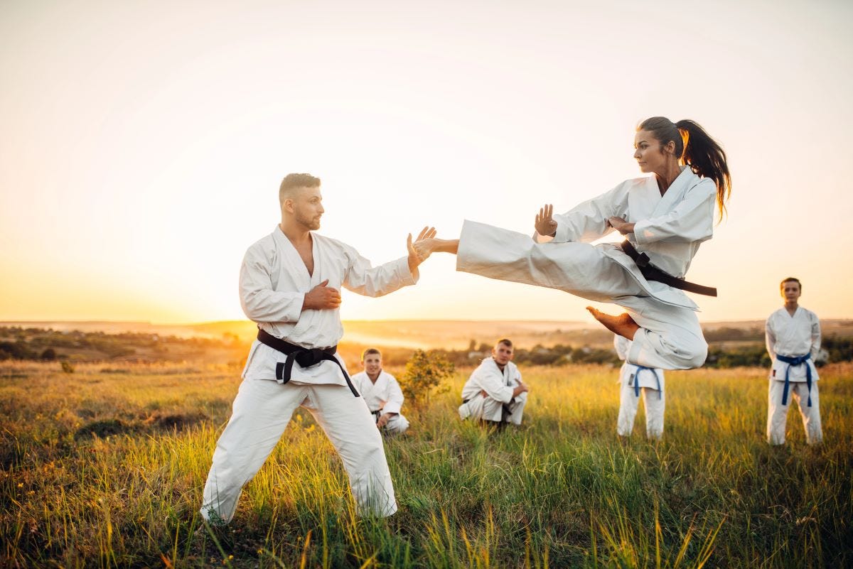 Female karate, jump kick