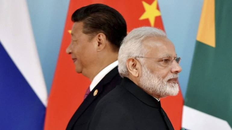 Chinese President Xi Jinping, left, and Prime Minister Narendra Modi. (Image source: AP/File)