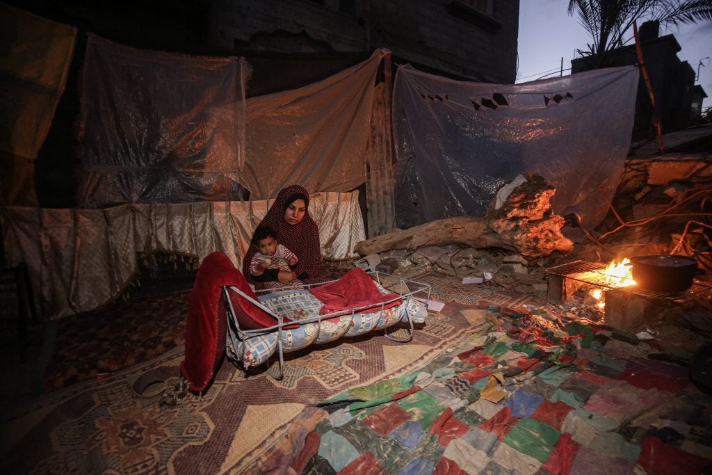 Displaced Palestinians in Gaza City struggle with power outages due to Israeli attacks that destroyed the infrastructure in the City, October 13, 2024. (Photo: Omar Ashtawy/APA Images)