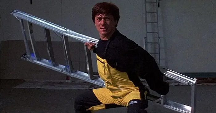 jackie Chan fighting with a stepladder