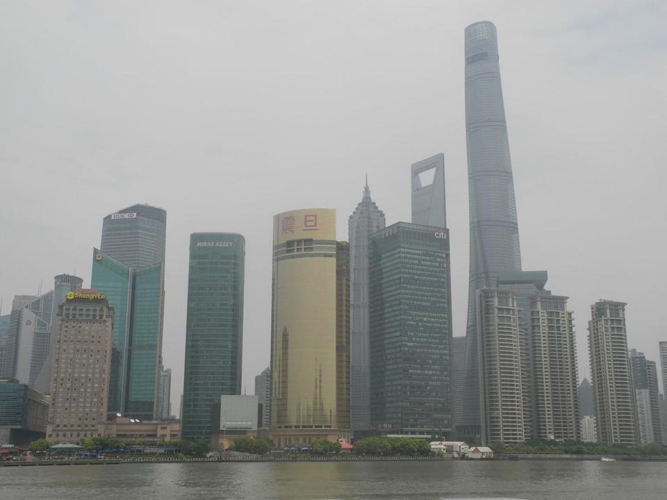 The skyline of Pudong, one of the most successful newly built financial districts in the world.