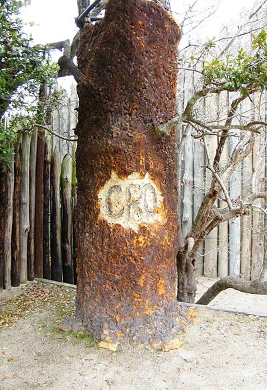 'CRO' written on a tree, part of the Lost Colony performance at Fort Raleigh National Historic Site. 