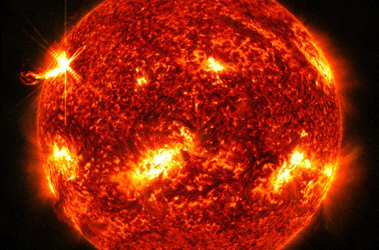 An X1.0 class solar flare flashes on the left edge of the Sun on January 10, 2023.