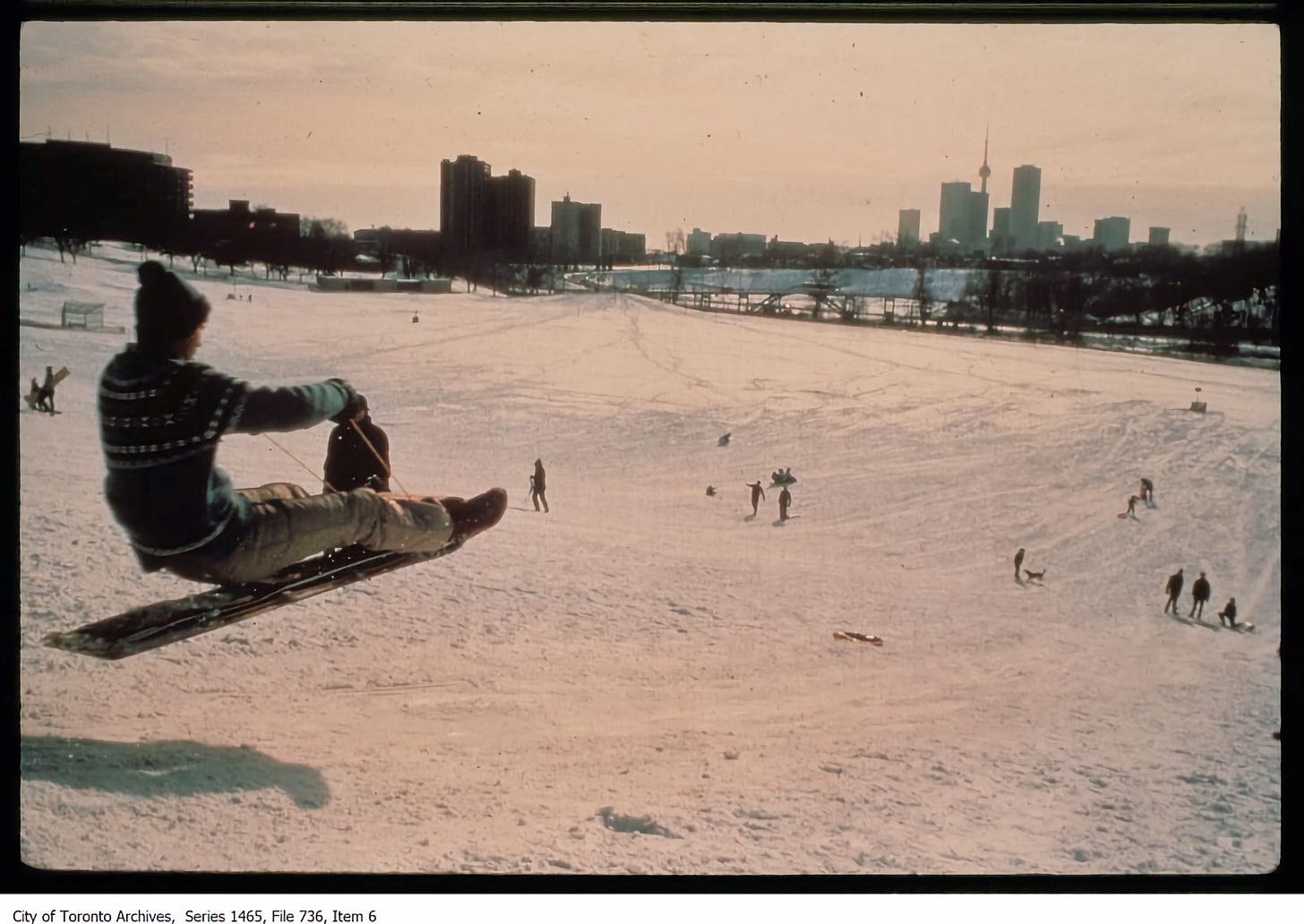 Archive photo of person catching big air while tobogganing at Riverdale Park