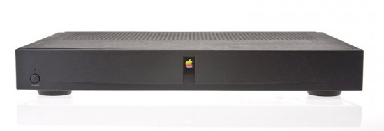 A small black rectangle with an Apple logo in the middle and a power button on the left.