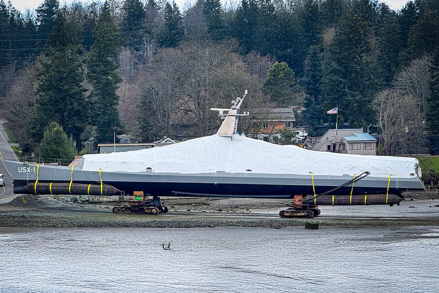 Image (extended using generative tools) of the Defiant being towed for launch
