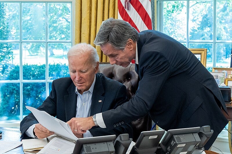 File:President Joe Biden is briefed by Secretary of State Antony Blinken on the terrorist assault on Israel on October 7, 2023 in the Oval Office of the White House.jpg