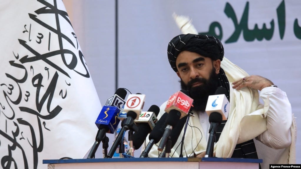 FILE - Taliban chief spokesman Zabihullah Mujahid speaks during an event in Kabul, Afghanistan, Nov. 25, 2021. 