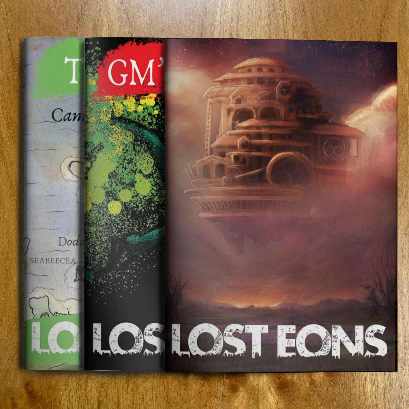 An image featuring the three Lost Eons zines, the Player Guide, the GM Guide, and The Fens Setting Guide.