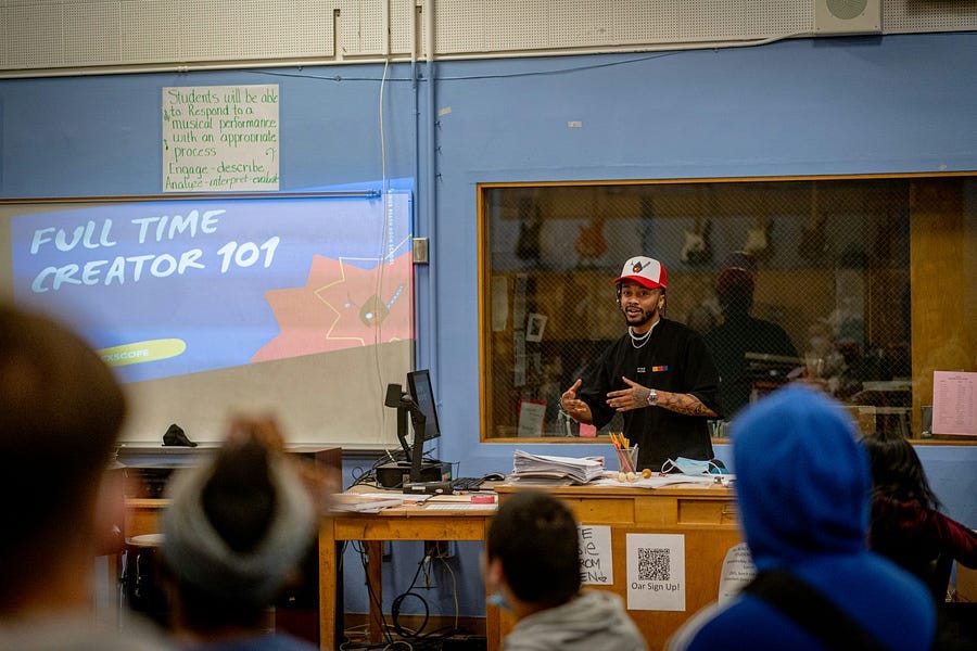 Teacher teaching students.