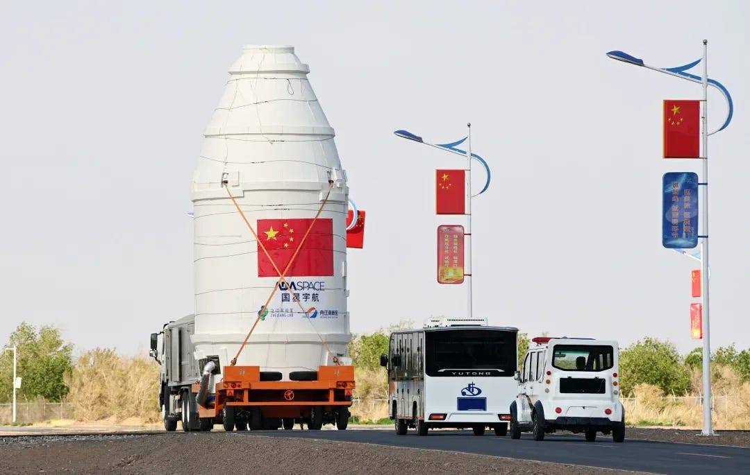 The fairing of the Long March 2D Y107, housing the twelve satellites, heading to the launch site.