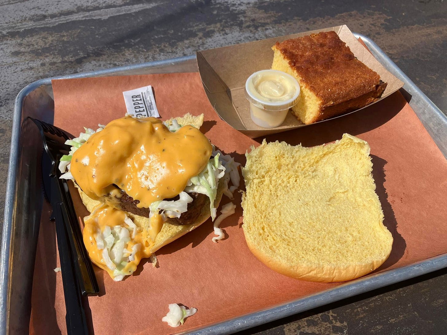 May be an image of chicken sandwich