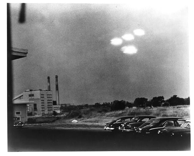 Above, an officially 'unexplained' UFO case from the Air Force's Project Blue Book files, a July 16, 1952 encounter photographed by Coast Guard seaman Shell Alpert of four UFOs seen through the window of a photographic laboratory near Salem, Massachusetts