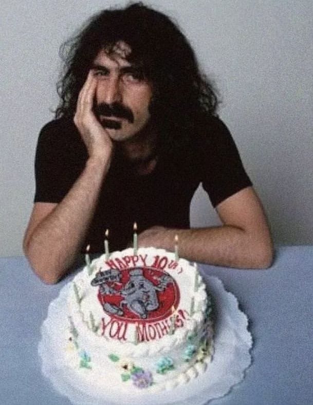 Frank Zappa with birthday cake