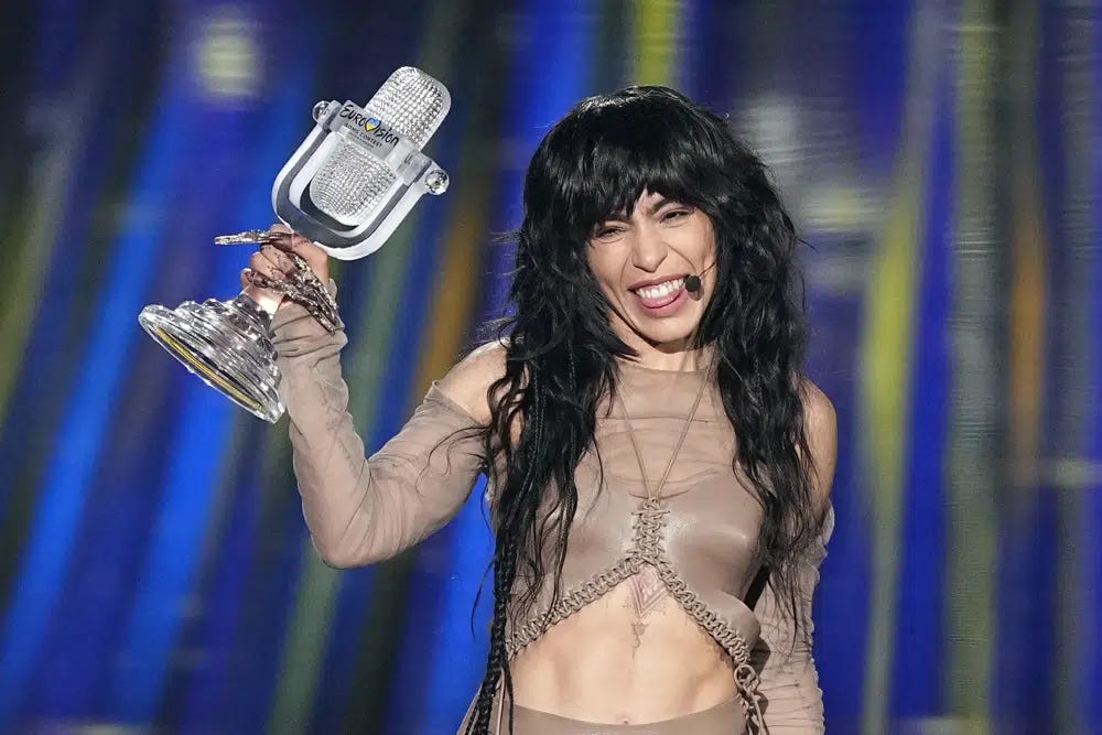 Loreen of Sweden celebrates with the trophy after winning the Grand Final of the Eurovision Song Contest in Liverpool, England, Saturday, May 13, 2023. (AP Photo/Martin Meissner)