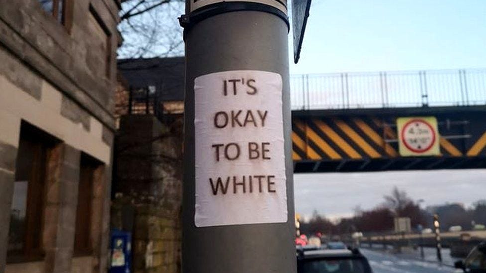 Perth city centre 'It's okay to be white' stickers condemned - BBC News