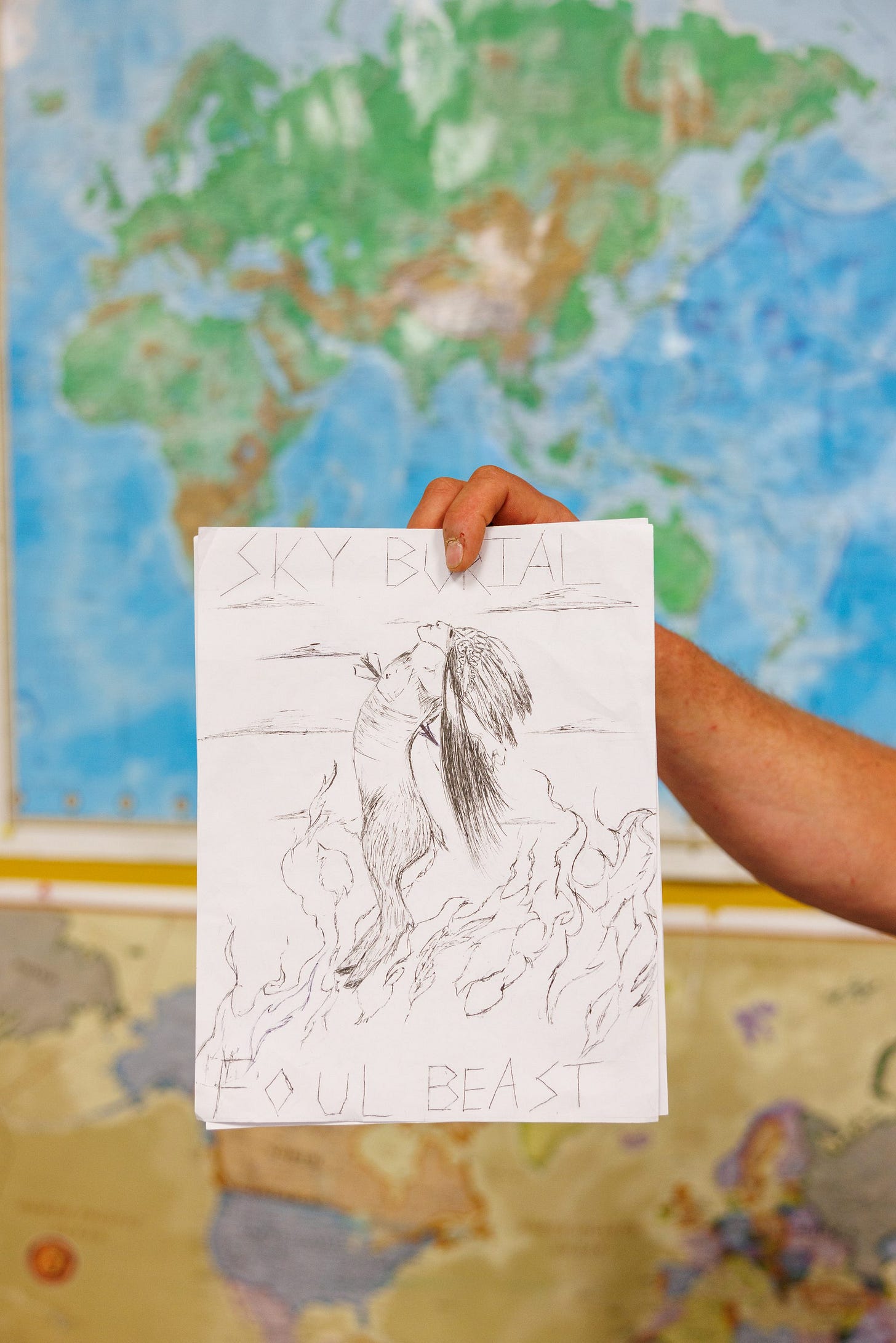 Colin Sibbernsen holds band artwork created by a student for Browning High School's heavy metal music class on Monday, May 19, 2025. The class was created by the nonprofit Firekeeper Alliance, which focuses on suicide prevention and building Indigenous mental health resources for tribal communities in Montana. Colin Sibbernsen holds band artwork created by a student for Browning High School's heavy metal music class on Monday, May 19, 2025. The class was created by the nonprofit Firekeeper Alliance, which focuses on suicide prevention and building Indigenous mental health resources for tribal communities in Montana.