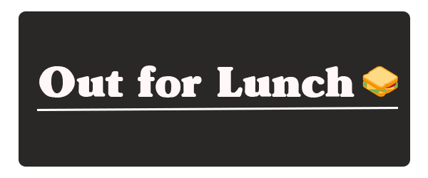 File:Out for lunch sign.png